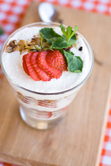 Light summer dessert with oatmeal, beaten yogurt and berries.