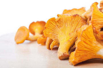 Chanterelles on wooden table