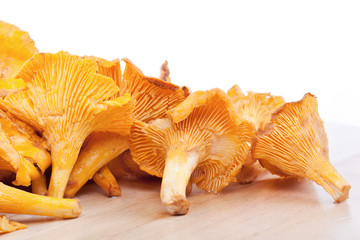 Chanterelles on wooden table