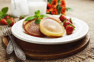 Homemade pancake with sugar powder
