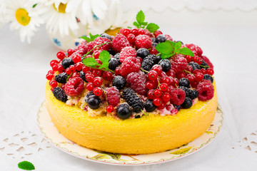 cake  with fresh summer  berries