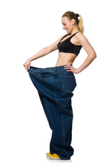 Dieting concept with big jeans on white