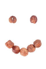 Smile face made of hazel