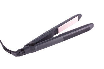 Hair straightener on white