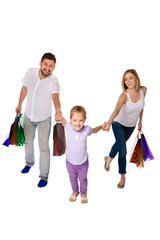 Obraz premium Happy family with shopping bags standing at studio 