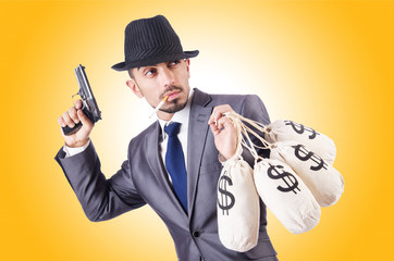 Businessman criminal with sacks of money