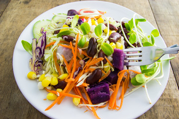 fresh vegetable salad In white dish