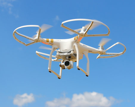 Drone quadrocopter with high resolution digital camera. New tool for aerial photo and video. 