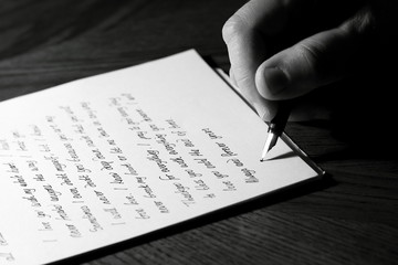 Writing a love letter
Man writing a love letter.