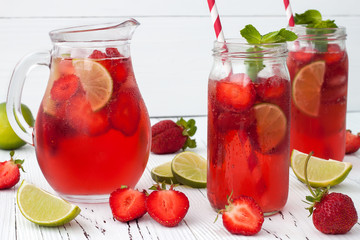 Summer homemade strawberry cocktail with rhubarb, lime and mint