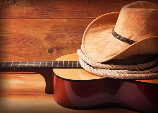 Country music picture with guitar and cowboy hat