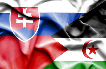 Waving flag of Western Sahara and Slovak