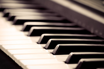 Black and white piano keys in vintage color tone,music concept