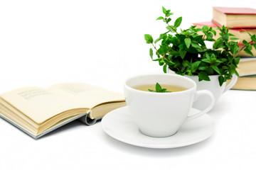 Cup of green tea with mint, close-up, selective focus