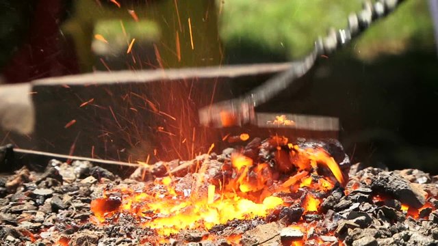 Burning Coal In The Forge