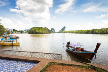 Fototapeta premium landscape cloud, blue sky, mountain and sea harbour at krabi tha