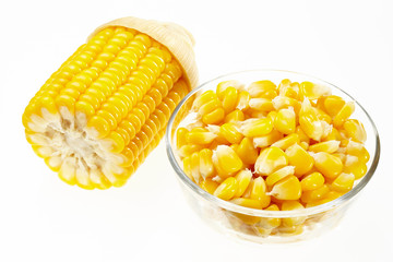 Corn in a small glass bowl isolated on white background