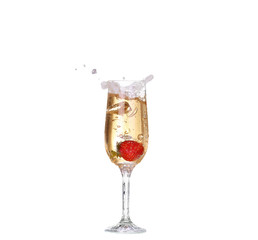 Single Strawberry splashing into a glass of champagne