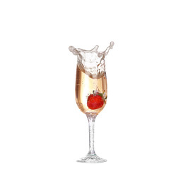 Single Strawberry splashing into a glass of champagne
