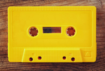 close up photo of stack of Cassette tapes over wooden table