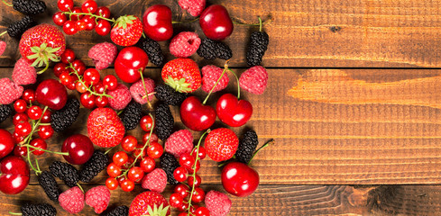 Collection of cherries, strawberries, mulberries, red currants,