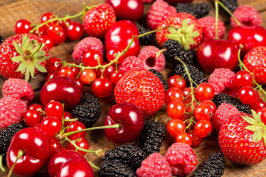 Collection of cherries, strawberries, mulberries, red currants,