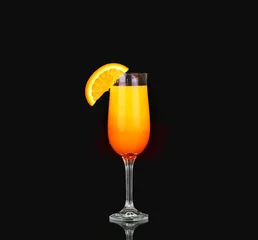Poster Mimosa cocktail glass  on black. design element © YURII Seleznov