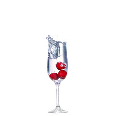 cherry splash in a cocktail glass on white