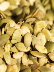 pumpkin seeds as a background. close