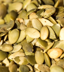 pumpkin seeds as a background. close