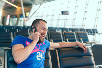 beautiful young man at the airport