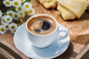 Delicious coffee and croissant