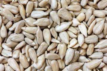 Shelled sunflower seeds. Background from above.