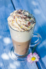 Cold latte with whipped cream