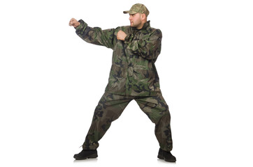 Young man in soldier uniform isolated on white