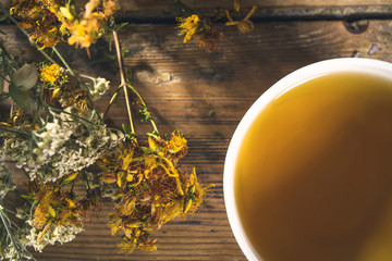 Close up of tea cup with herbs   © yossarian6