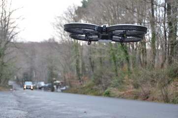 Fototapeta premium Flying drone in forest