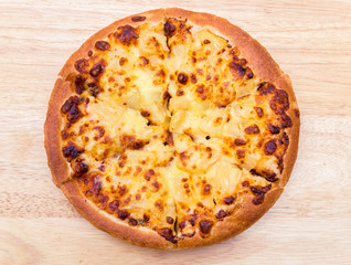 Pizza on wooden background