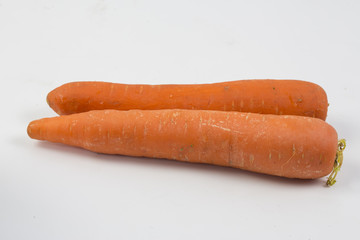 Carrot vegetable with leaves isolated on white background cutout