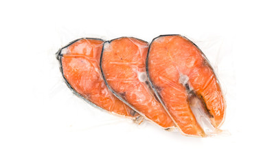 Frozen salmon fillets in a vacuum package