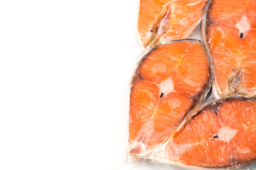 Frozen salmon fillets in a vacuum package