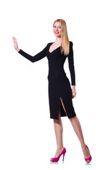 Fototapeta premium Young girl in black dress pushing isolated on white