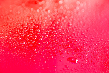 Drops of water on red  floor