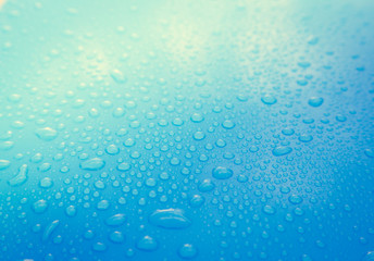 Drops of water on blue floor