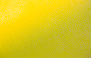 Drops of water on yellow floor