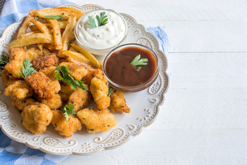 Served chicken nuggets and french fries