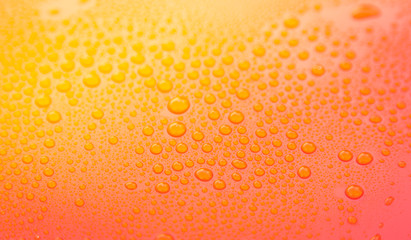 Drops of water on yellow floor