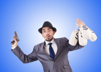 Businessman criminal with sacks of money