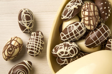 Chocolate Easter Eggs Over Wooden Background