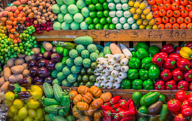 Fruit market with various colorful fresh fruits and vegetables